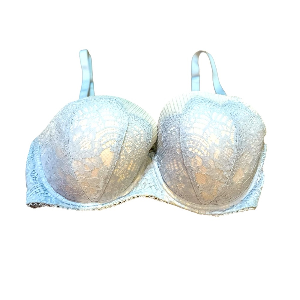 Victoria's Secret 36DDD lined Demi. Bra is baby blue lace with white background